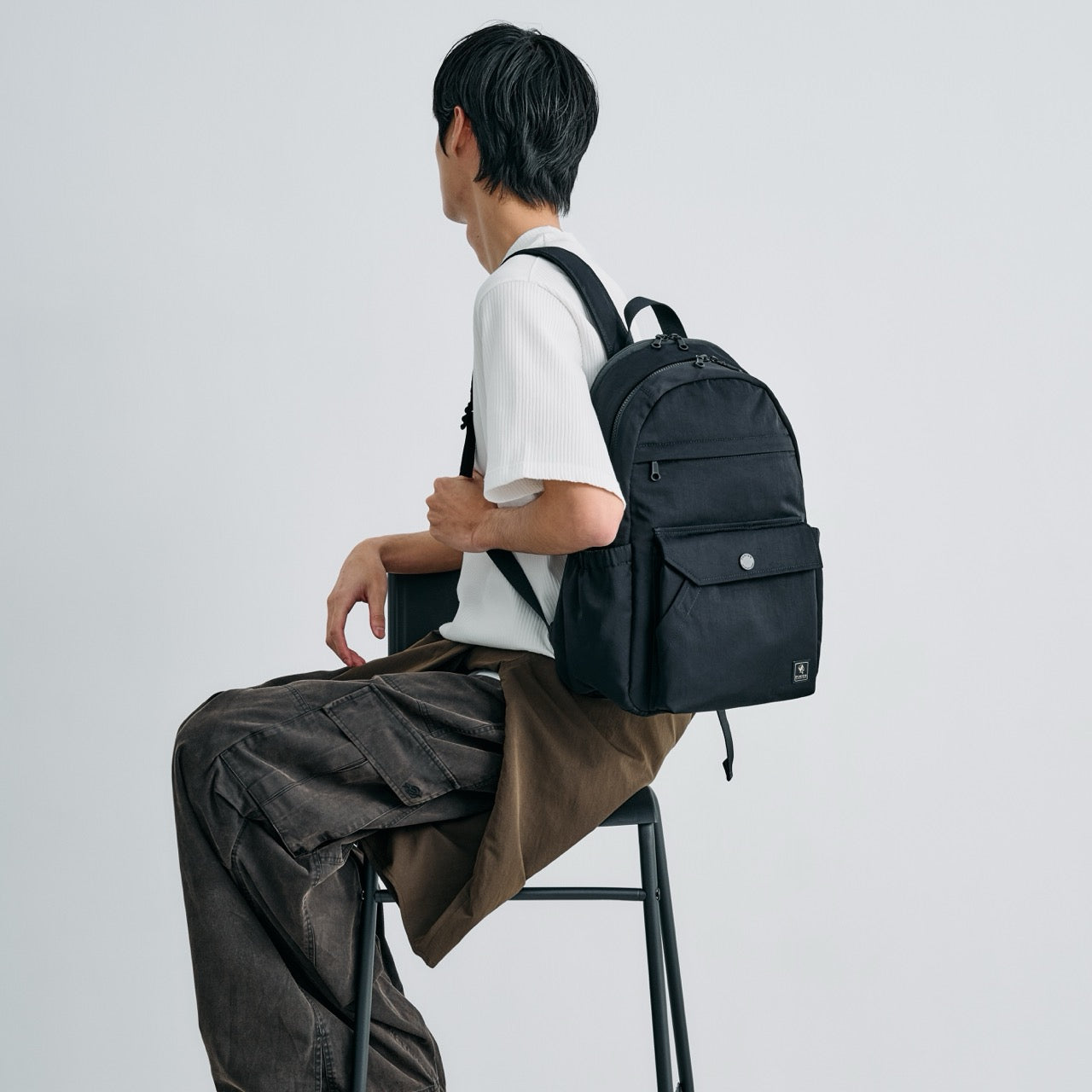PORTER INTERNATIONAL Lapse Backpack Black textured fabric backpack front flap pocket zip compartments everyday carry
