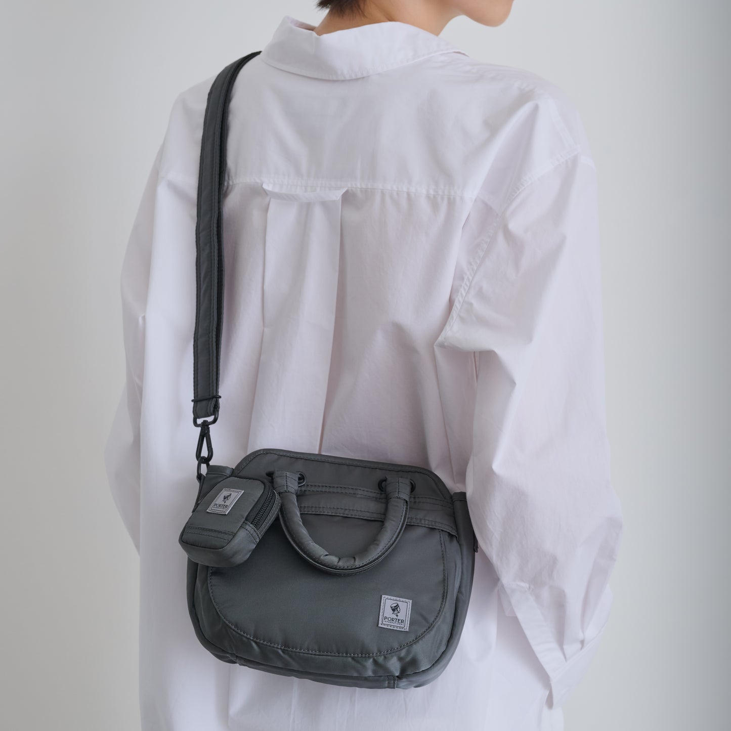 PORTER INTERNATIONAL Harbor Handbag Version 2 Grey textured fabric shoulder bag top handle detachable strap mini pouch