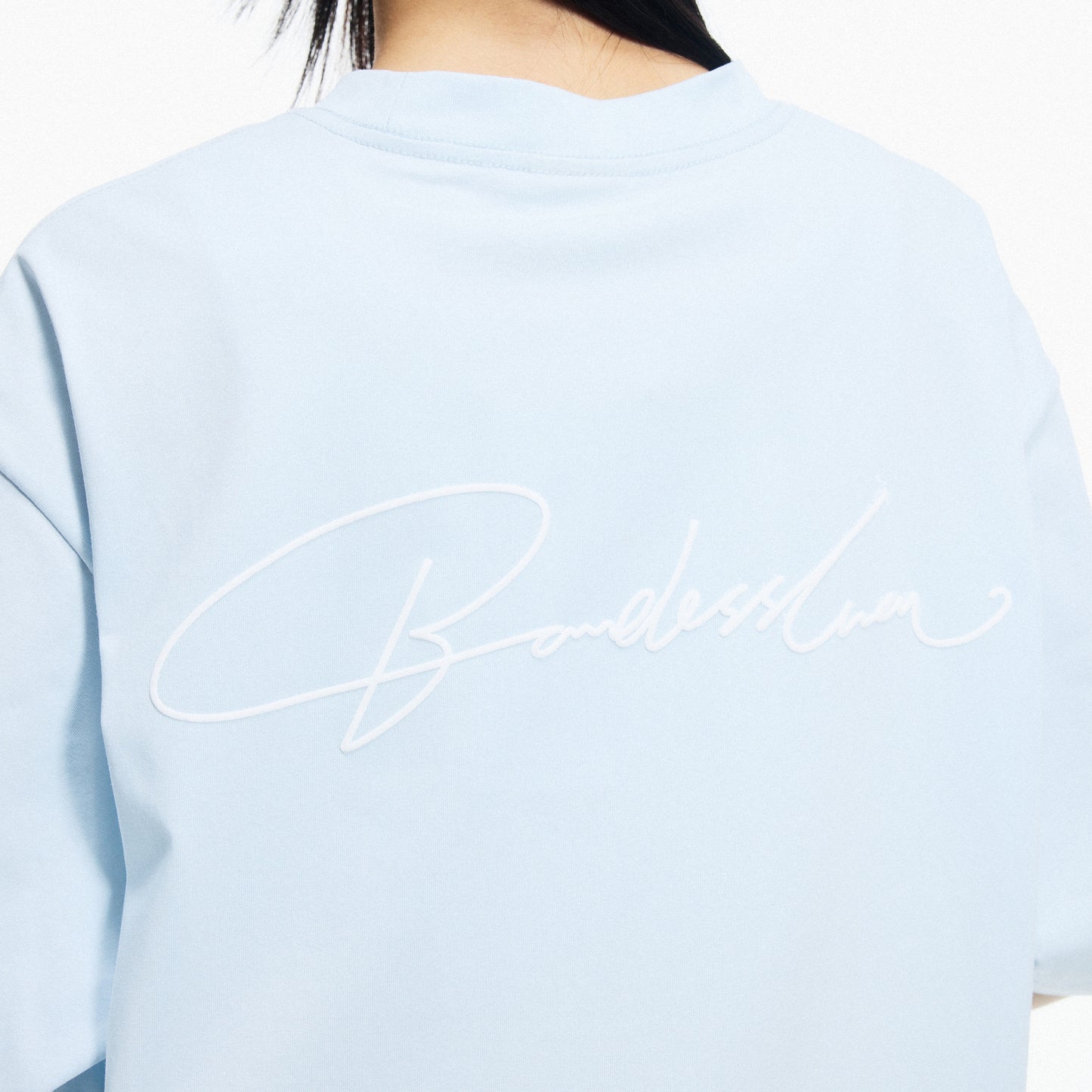 Boneless Calligraphy Print T-Shirt Light Blue with minimalist logo design