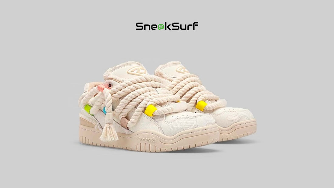 Cat & Sofa sneaker in cream beige, featuring dreadlock-inspired laces, a chunky retro silhouette, and playful design details that blend statement style with everyday comfort.