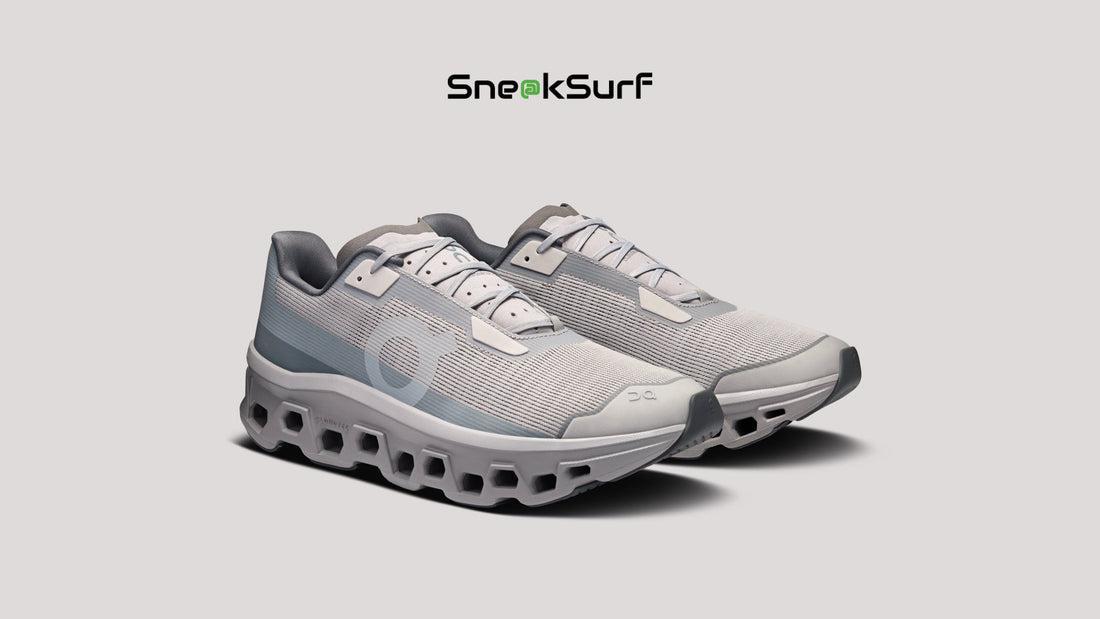 ON Cloudmonster Void ‘Alloy Glacier’ running shoe featuring a lightweight mesh upper, oversized CloudTec cushioning, and a neutral grey-blue colourway designed for maximum comfort and performance.