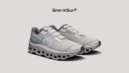 ON Cloudmonster Void ‘Alloy Glacier’ running shoe featuring a lightweight mesh upper, oversized CloudTec cushioning, and a neutral grey-blue colourway designed for maximum comfort and performance.