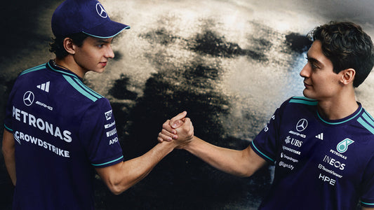 Kimi Antonelli and George Russell wearing the adidas Mercedes-AMG PETRONAS Formula One Team collection in the Vanda Bloom colourway.