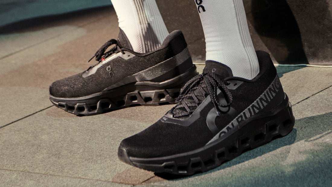 On Cloudmonster 2 Black/Black running shoes with all-black mesh upper and cushioned sole
