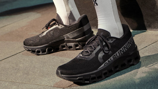 On Cloudmonster 2 Black/Black running shoes with all-black mesh upper and cushioned sole