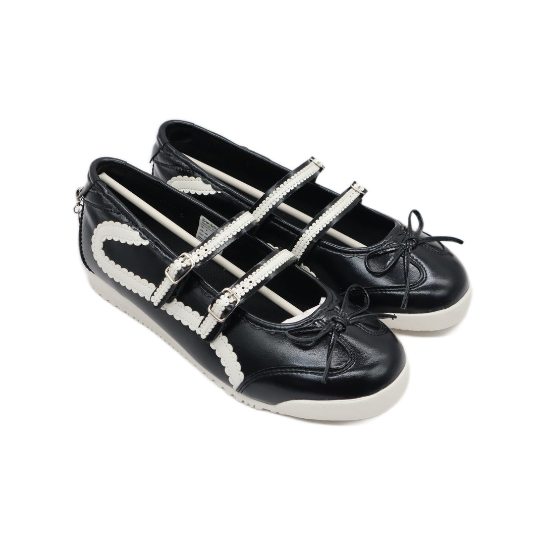 SneakSurf Mary Jane Black White/Cream - angled pair view showing the rounded toes and buckle straps