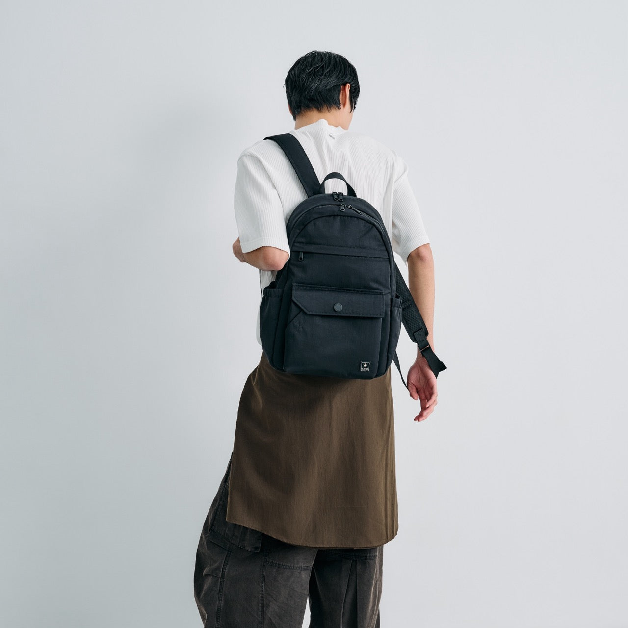 PORTER INTERNATIONAL Lapse Backpack Black textured fabric backpack front flap pocket zip compartments everyday carry
