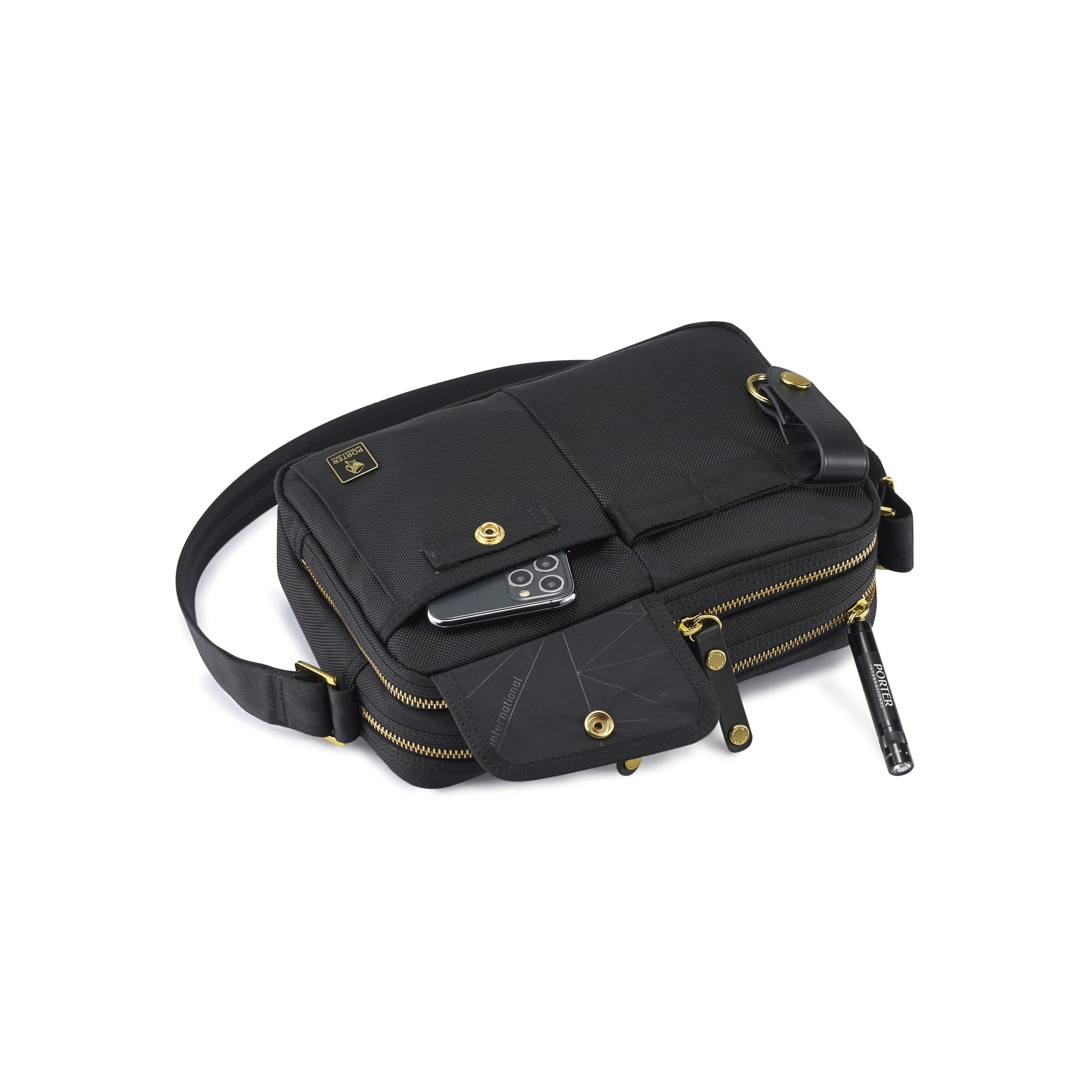 PORTER INTERNATIONAL New Heat Shoulder Bag Small Black compact shoulder bag with multiple zip compartments and adjustable strap