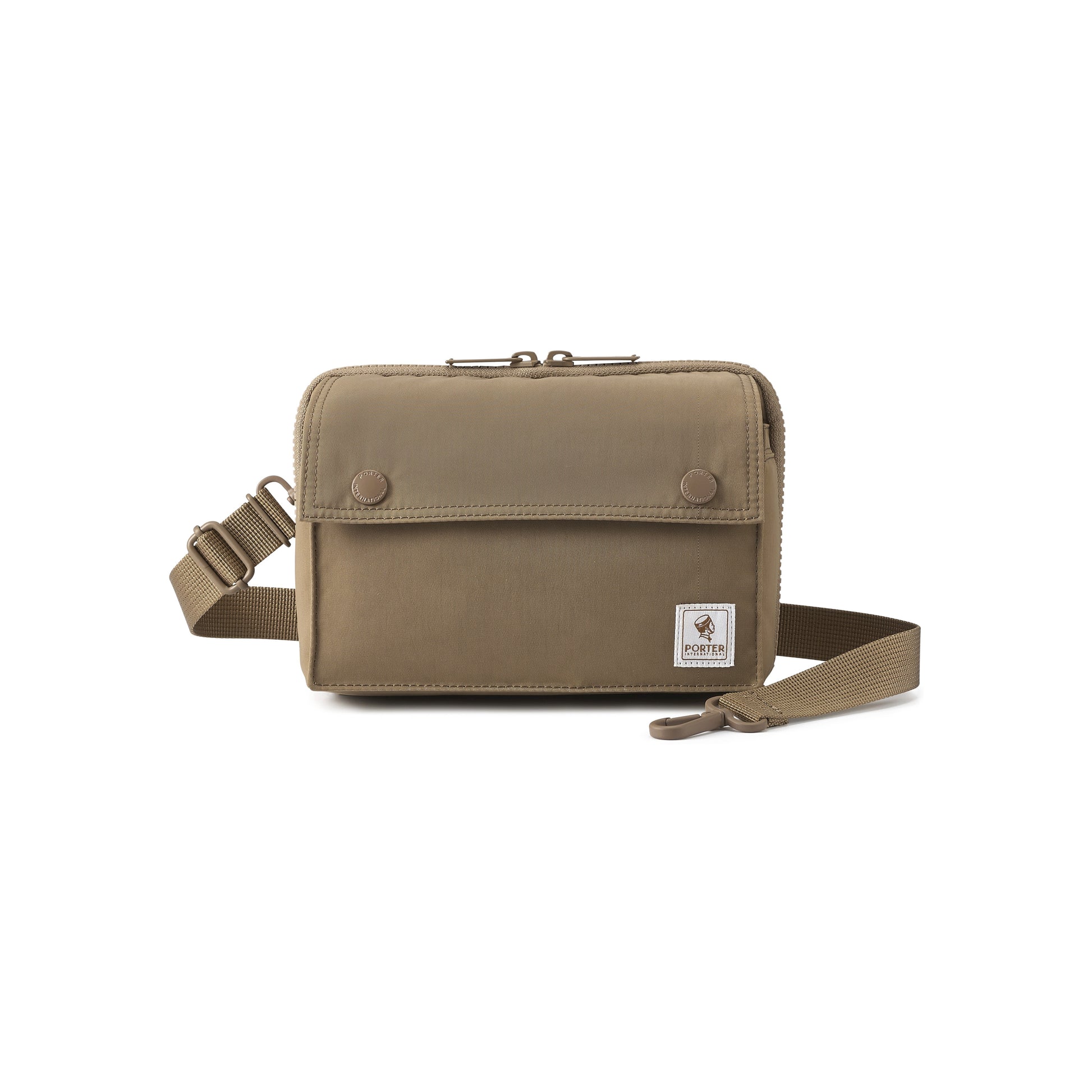 Shop PORTER INTERNATIONAL Mid Shoulder Bag M Brown at SneakSurf. Compact textured crossbody with flap pocket and adjustable strap.