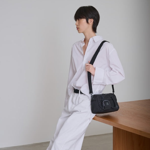 PORTER INTERNATIONAL Harbor Handbag Version 1 Black textured fabric shoulder bag top handle detachable strap mini pouch