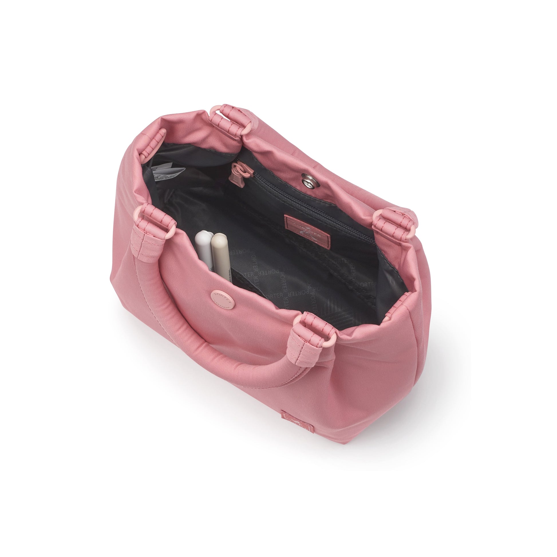 PORTER INTERNATIONAL Cush Handbag Pink lightweight handbag minimalist design adjustable strap everyday carry bag