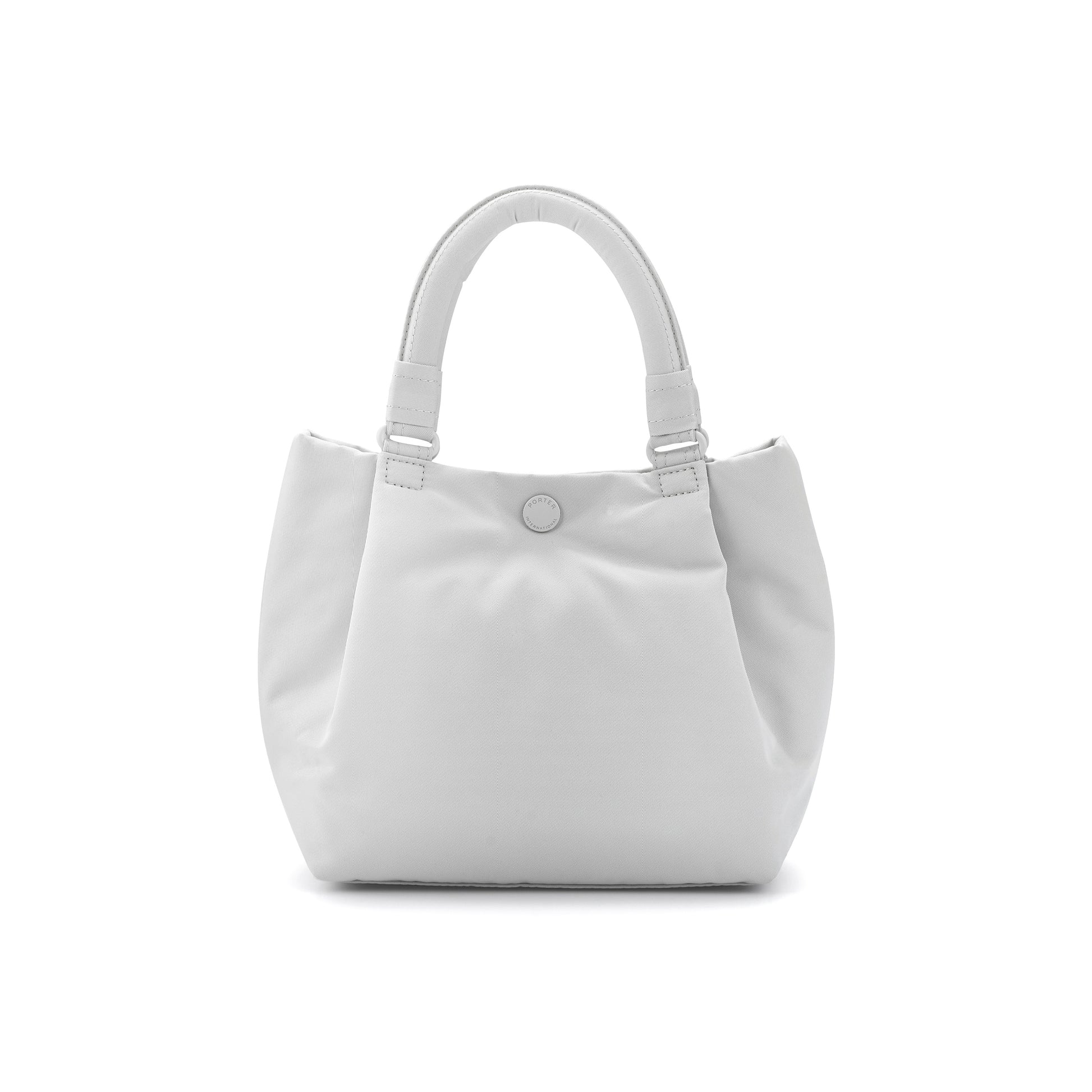 PORTER INTERNATIONAL Cush Handbag Beige lightweight handbag minimalist design adjustable strap everyday carry bag