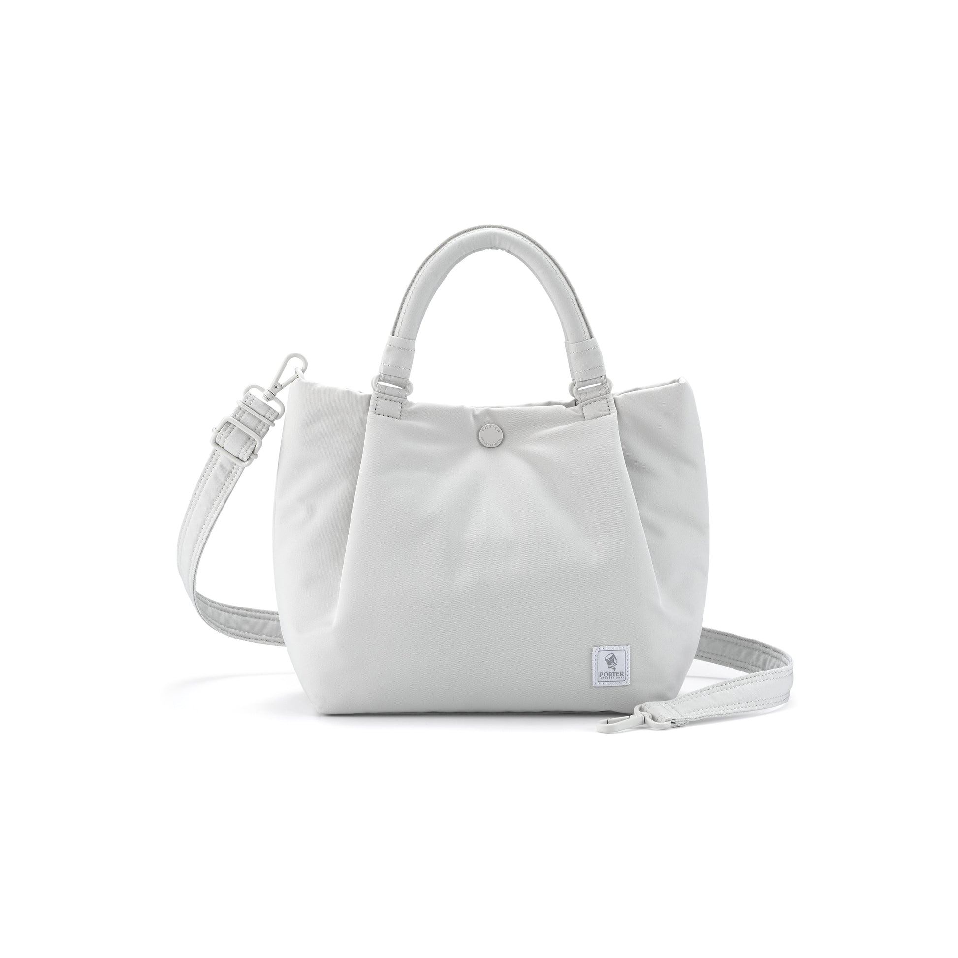 PORTER INTERNATIONAL Cush Handbag Beige lightweight handbag minimalist design adjustable strap everyday carry bag