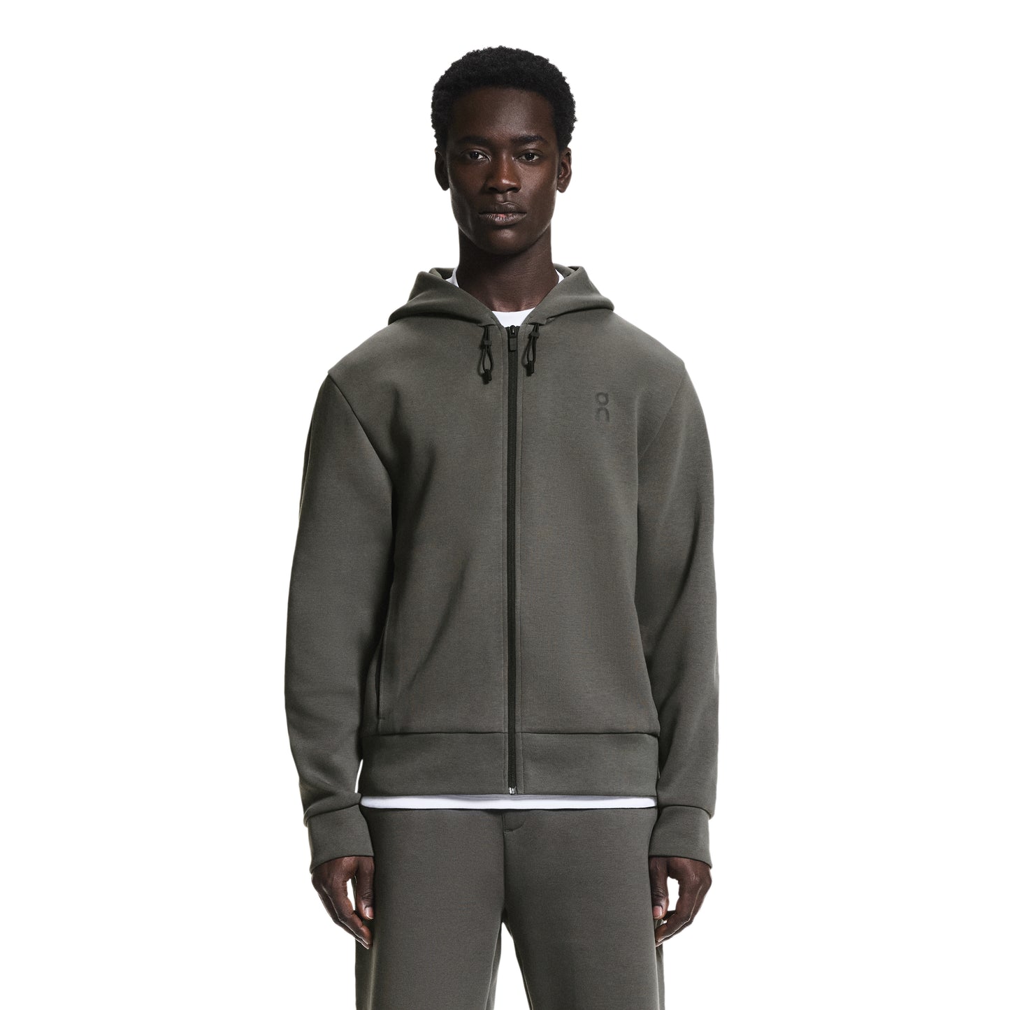ON Cloud Focus Tech Zip Hoodie ‘Shadow’ – men’s olive grey performance zip hoodie with hood, slim athletic fit, front view worn by model