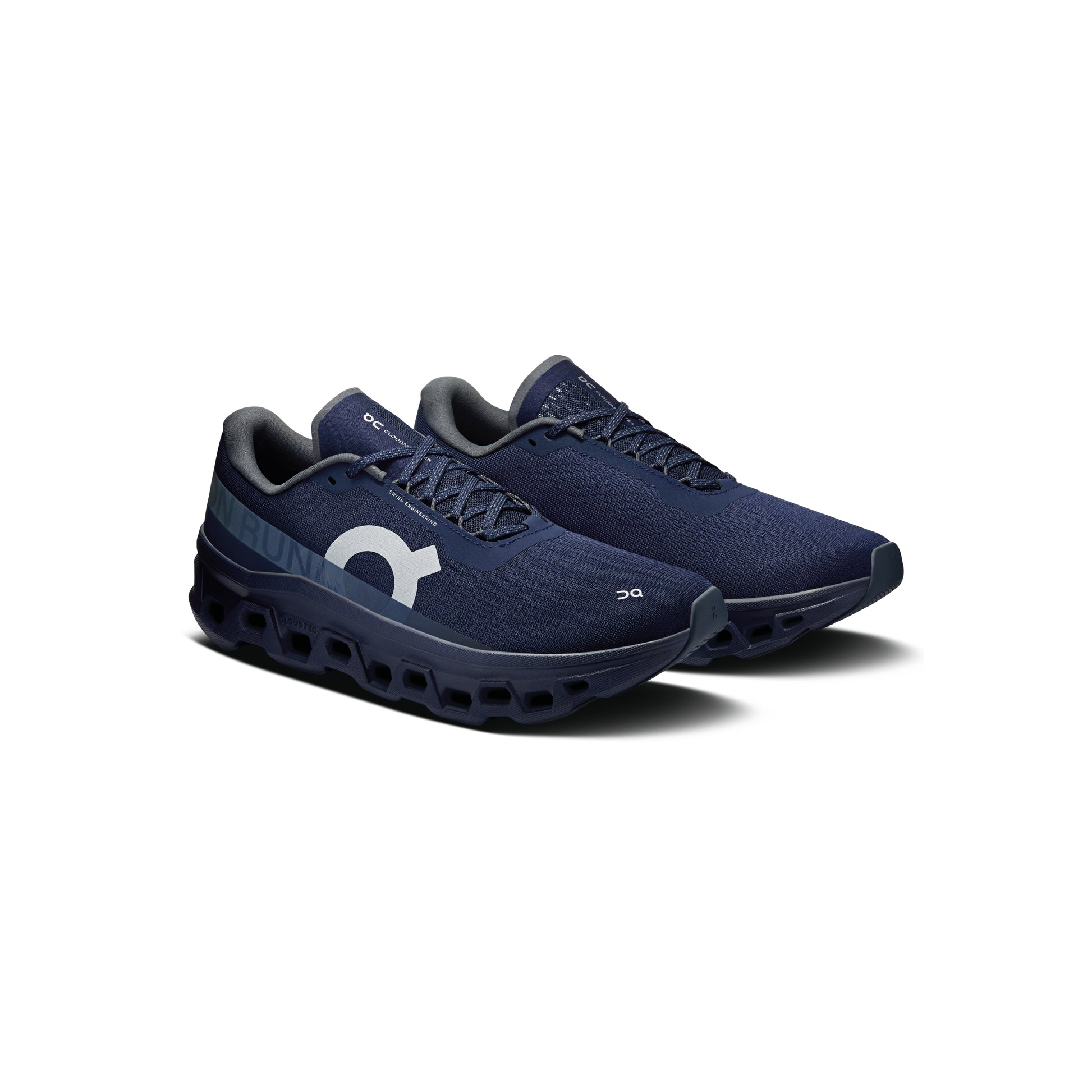 ON Cloudmonster Midnight Navy running shoe with oversized CloudTec cushioning Helion superfoam and breathable engineered mesh upper