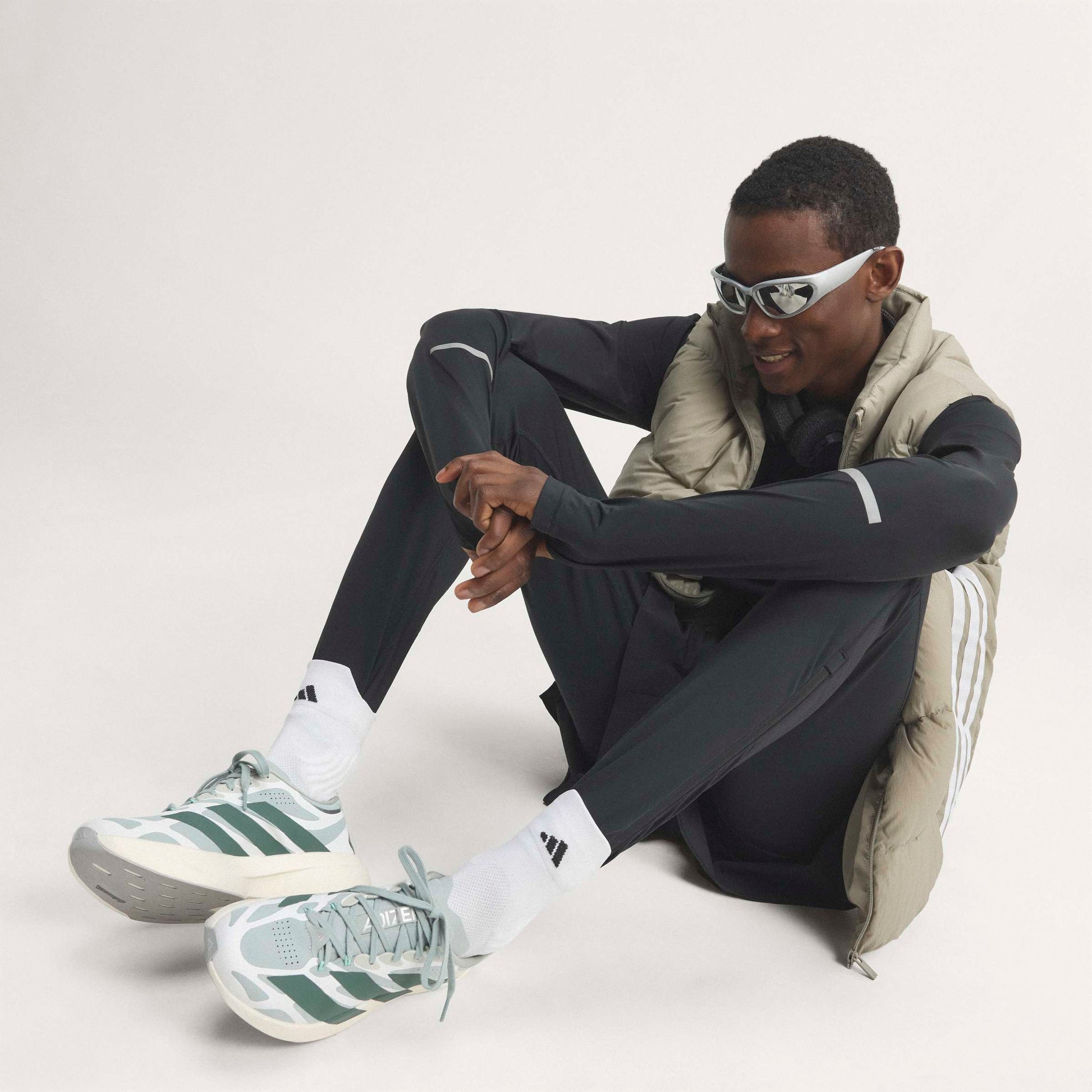 adidas Adizero Evo SL Exo Wonder Sage Silver Ivy White running shoe with LIGHTSTRIKE PRO midsole and breathable mesh upper