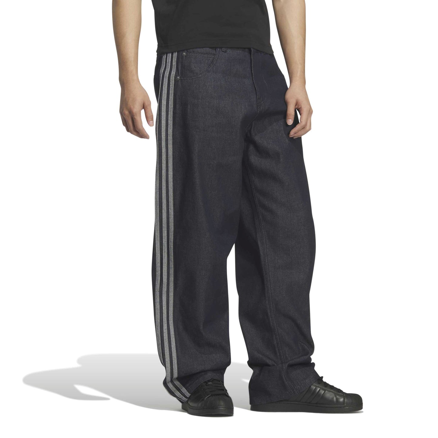 adidas Denim Firebird Track Pants Indigo Denim with premium denim fabric relaxed fit and signature adidas 3-Stripes