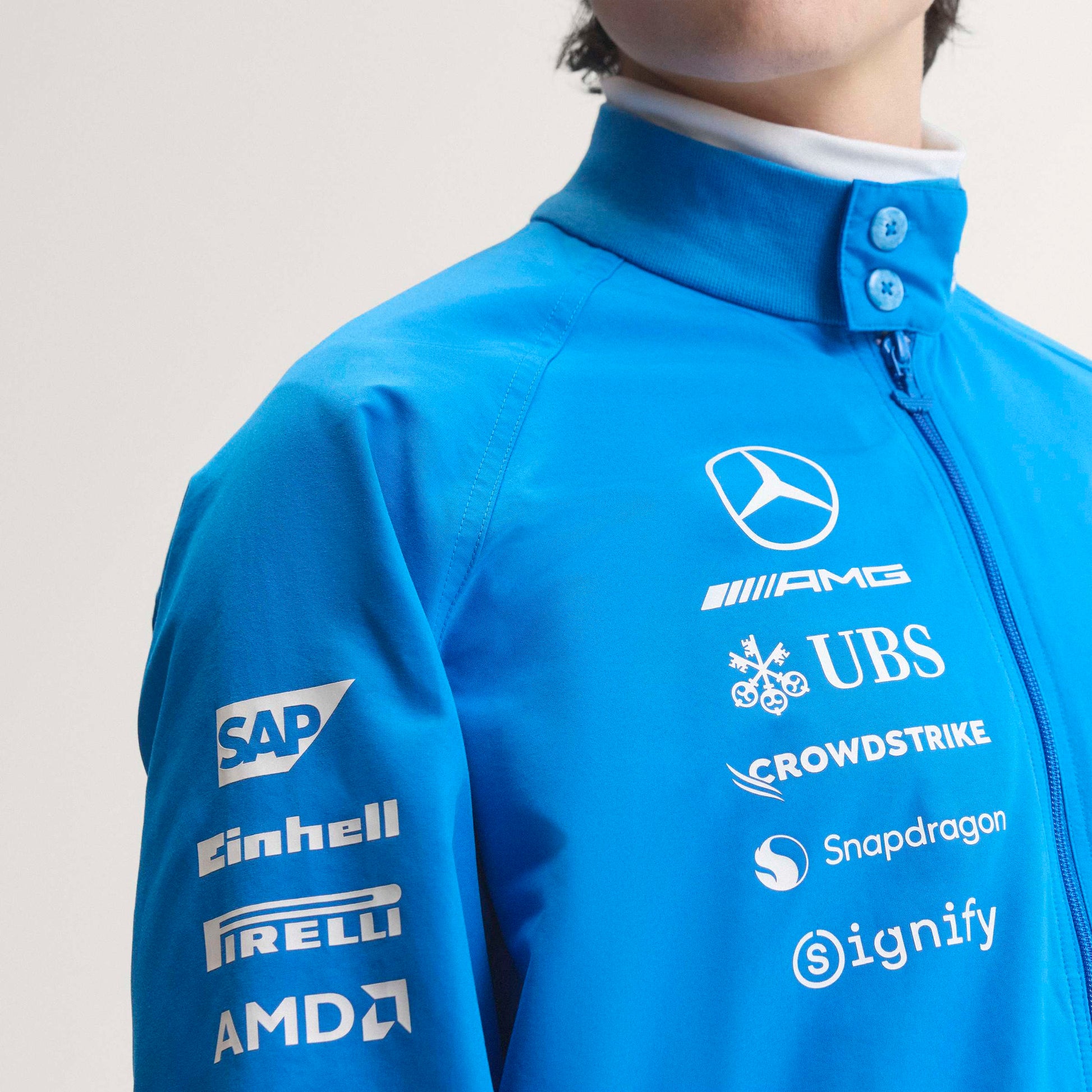 adidas Mercedes-AMG Petronas Formula One Team Blue Wonder Arrow Driver Harrington Jacket Blue White with official sponsor logos and full zip design
