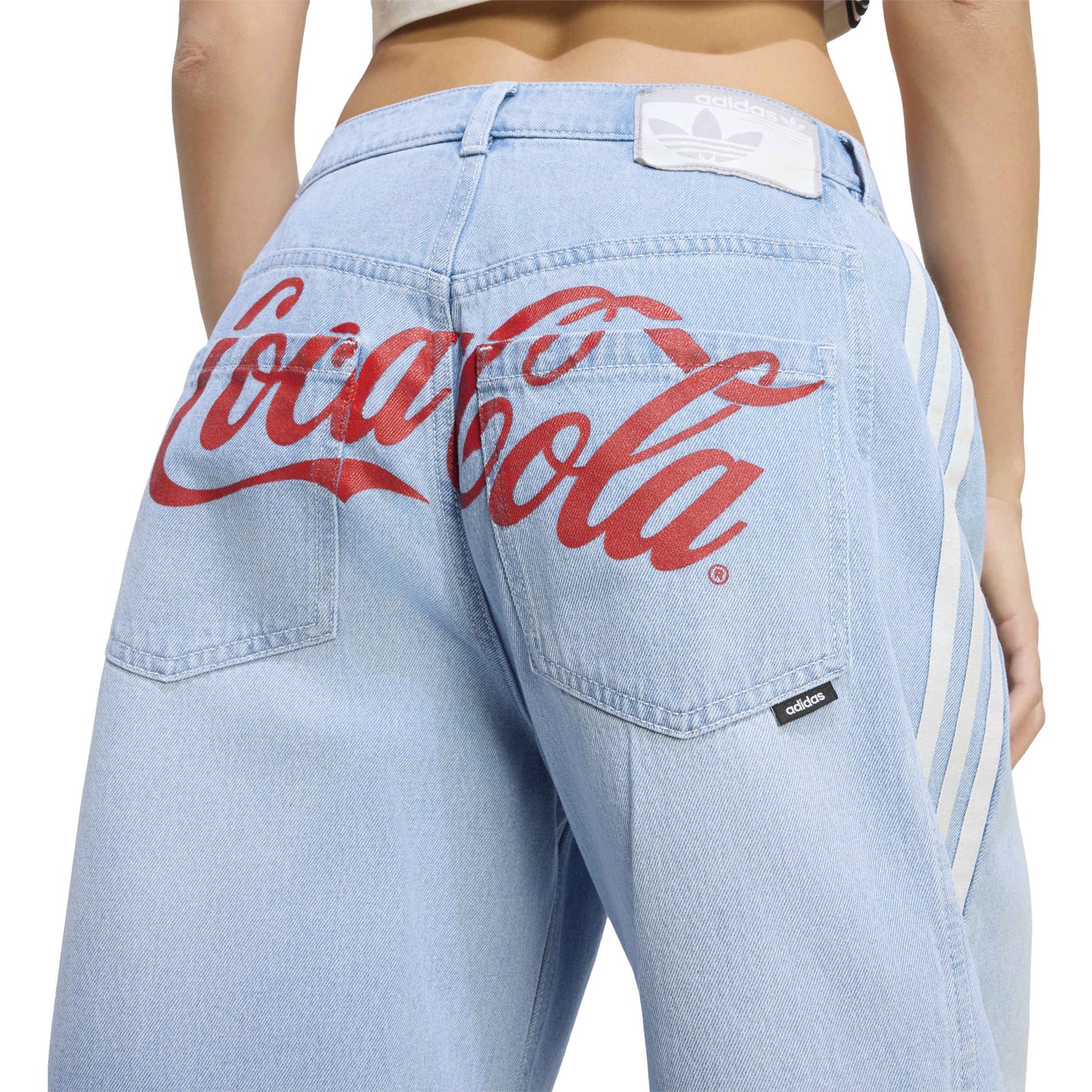 adidas Originals x Coca-Cola GFX Banana Pants Indigo Blue wide leg denim jeans with Coca-Cola graphic and adidas 3-Stripes