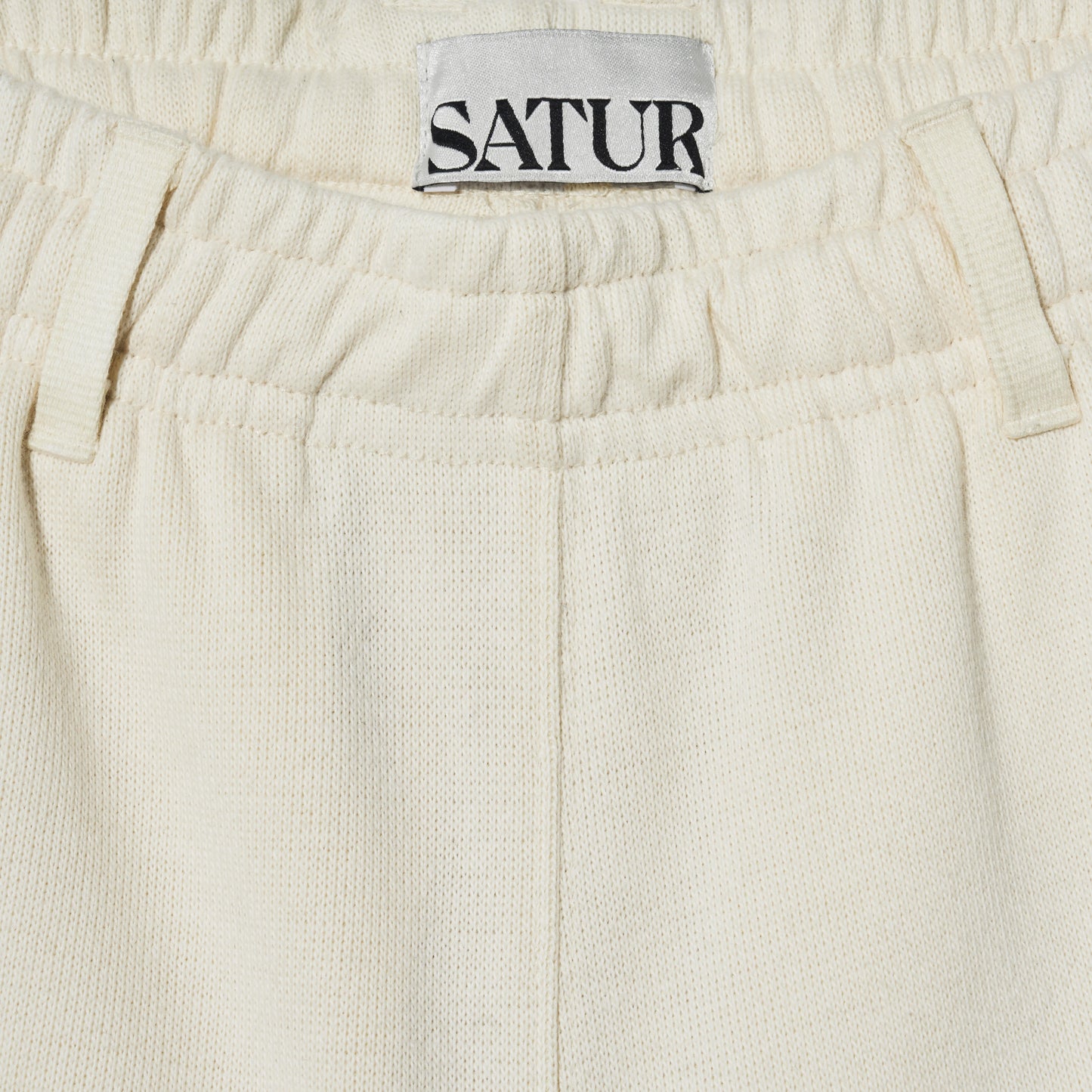 SATUR Lawton All Day Track Shorts Cream womens lightweight shorts elastic waistband side pockets embroidered logo casual apparel
