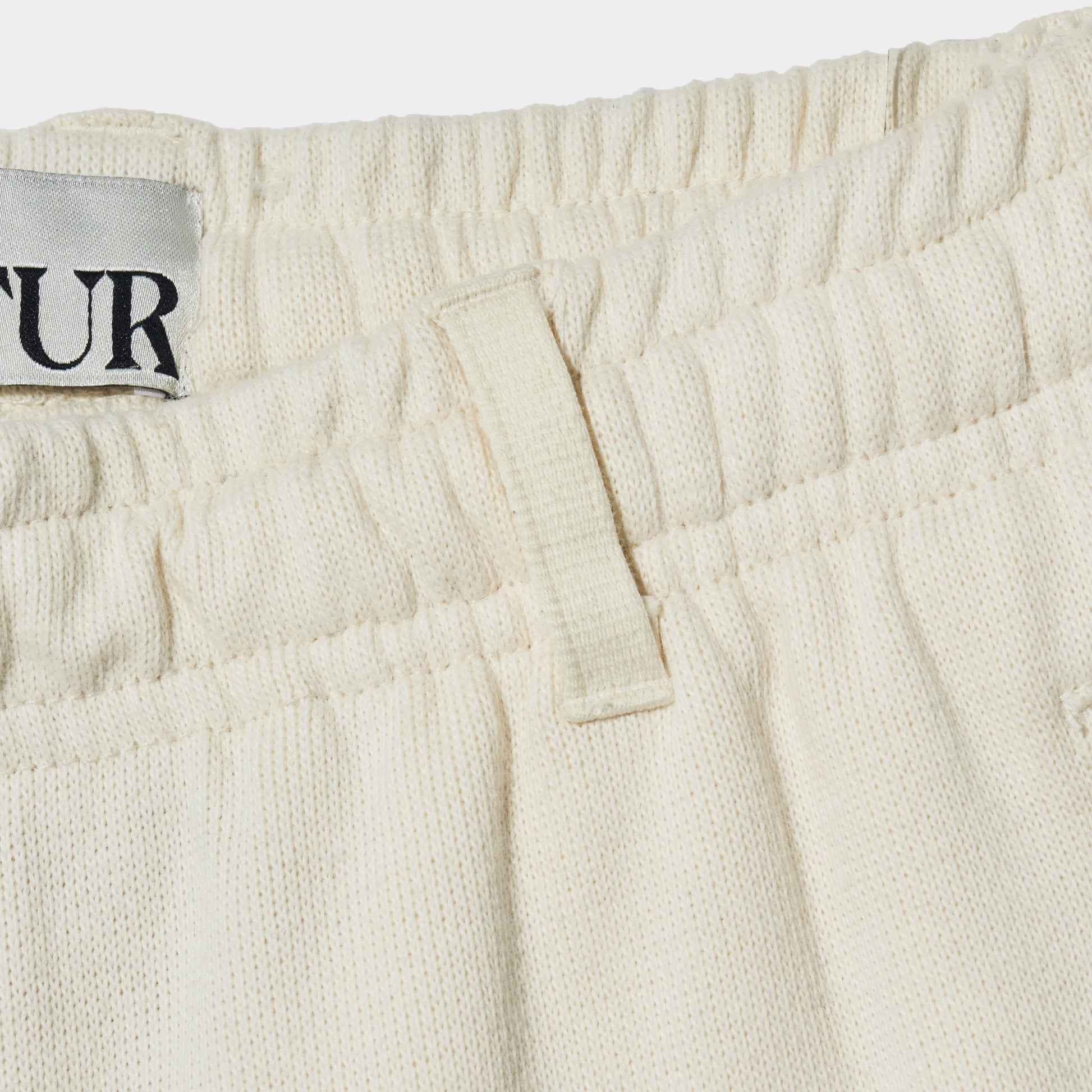 SATUR Lawton All Day Track Shorts Cream womens lightweight shorts elastic waistband side pockets embroidered logo casual apparel