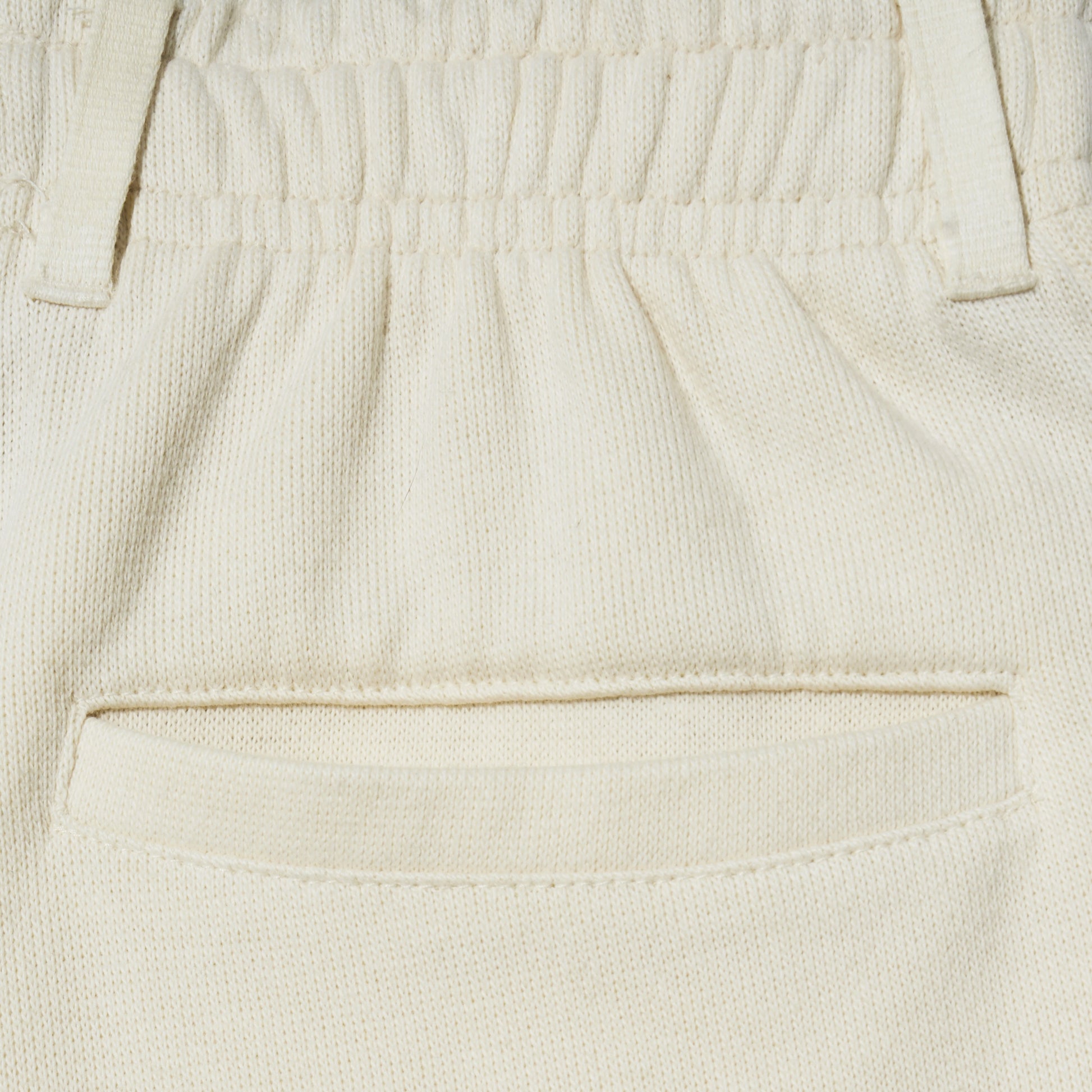 SATUR Lawton All Day Track Shorts Cream womens lightweight shorts elastic waistband side pockets embroidered logo casual apparel