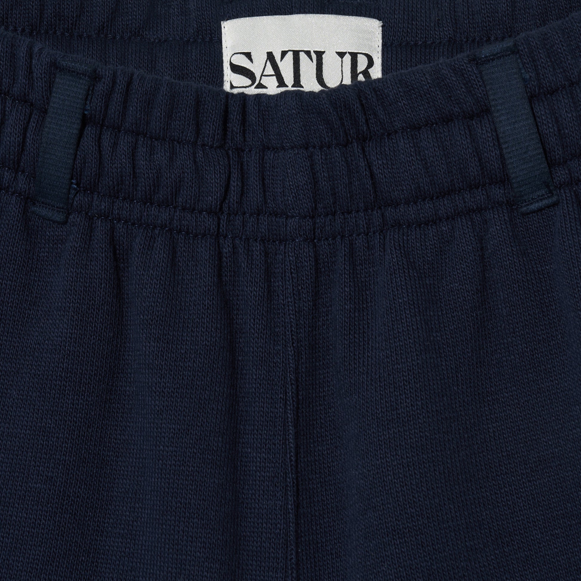 SATUR Lawton All Day Track Shorts Navy womens lightweight shorts elastic waistband side pockets embroidered logo casual apparel