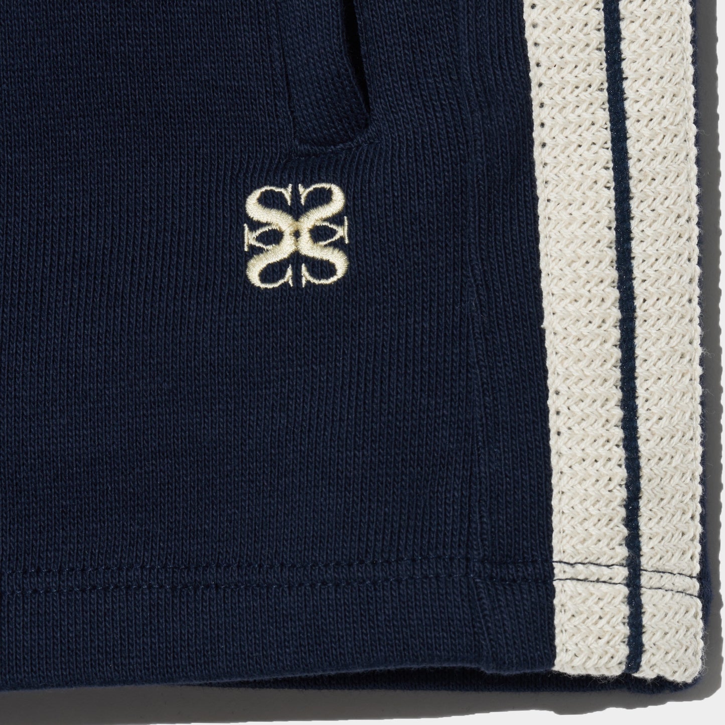 SATUR Lawton All Day Track Shorts Navy womens lightweight shorts elastic waistband side pockets embroidered logo casual apparel