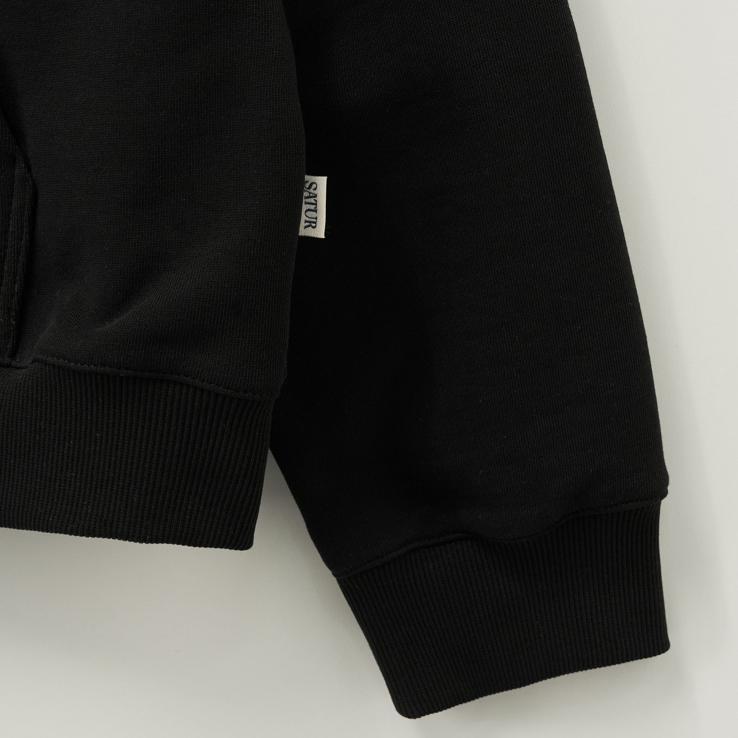 SATUR Loren Small Logo Hood Zip Up Black cotton blend hoodie full zip drawstring hood embroidered logo casual apparel