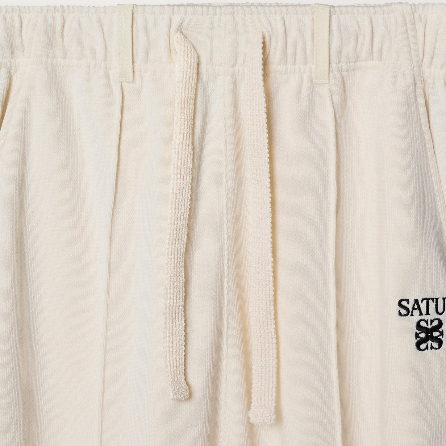 SATUR Lawton Lining Track Pants Cream Black womens lightweight track pants elastic waistband drawstring side stripe casual apparel