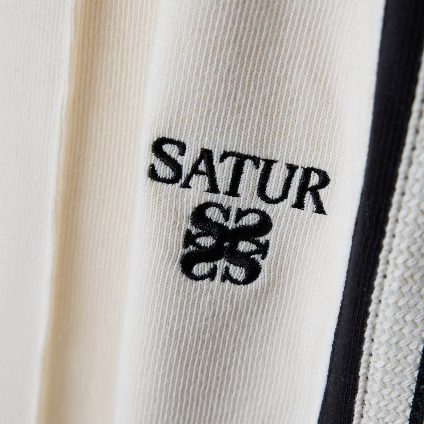 SATUR Lawton Lining Track Pants Cream Black womens lightweight track pants elastic waistband drawstring side stripe casual apparel