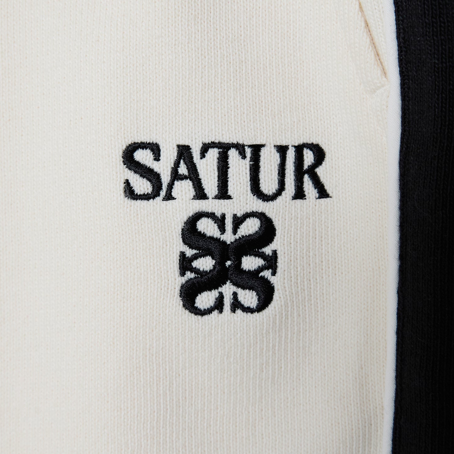 SATUR Lawton Lining Track Pants Cream Black womens lightweight track pants elastic waistband drawstring side stripe casual apparel