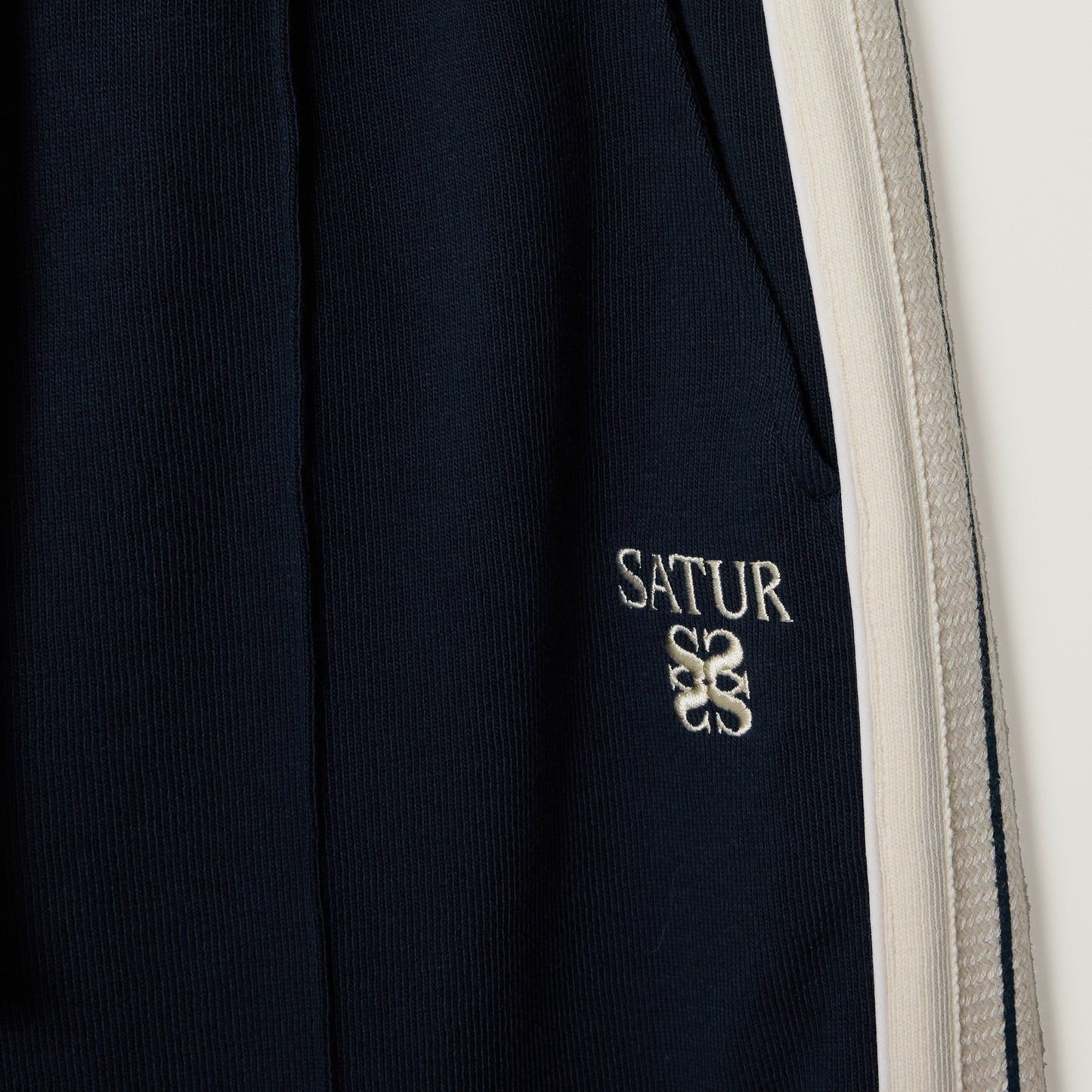 SATUR Lawton Lining Track Pants Navy womens lightweight track pants elastic waistband drawstring side stripe casual apparel